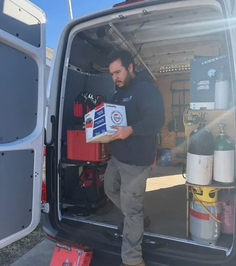 Furnace technician responding during cold Oklahoma weather