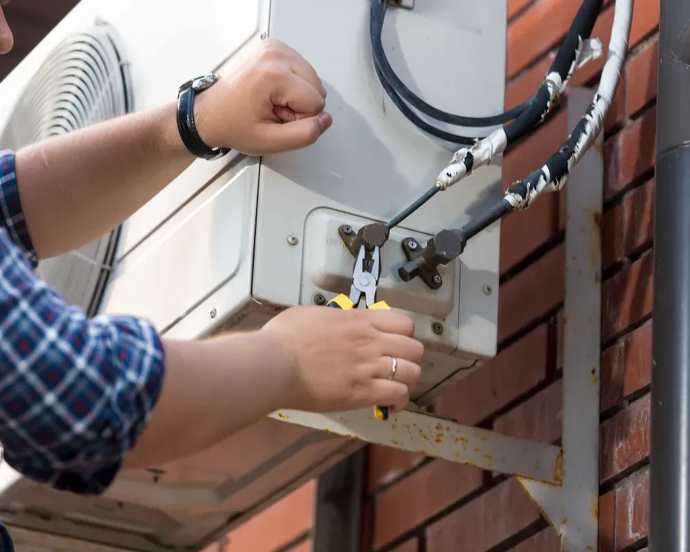 HVAC consultation comparing single-stage and two-stage furnaces